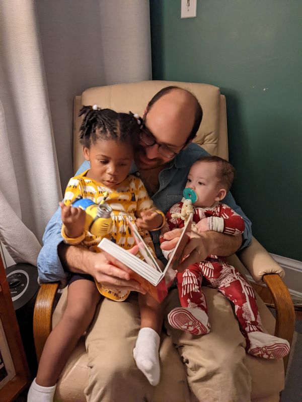 Matthew Reading a Bedtime Story to Charlotte & a Friend's Child