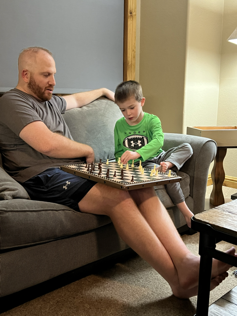 Paul Playing Chess with our Nephew