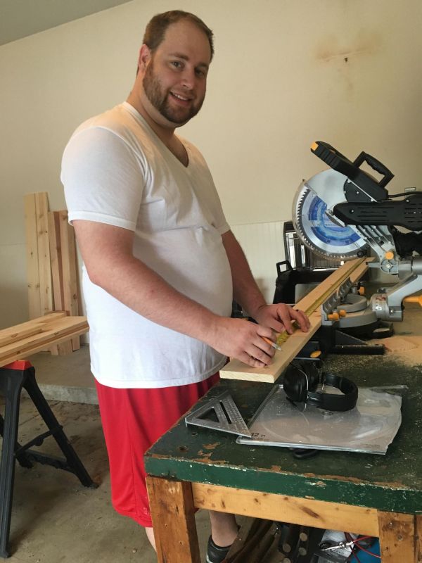 Joel Building Our New Bed Frame